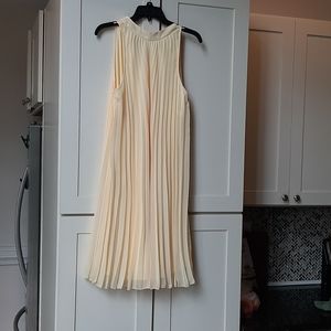 Lovely pale yellow halter pleated dress
